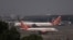 Air India passenger jets are seen on the tarmac at Chhatrapati Shivaji International airport in Mumbai, India, Feb. 14, 2023.
