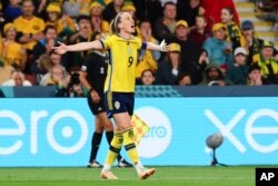 Sweden's Kosovare Asllani celebrates after scoring her team's second goal during the Women's World Cup third place playoff soccer match between Australia and Sweden in Brisbane, Australia, Aug. 19, 2023.