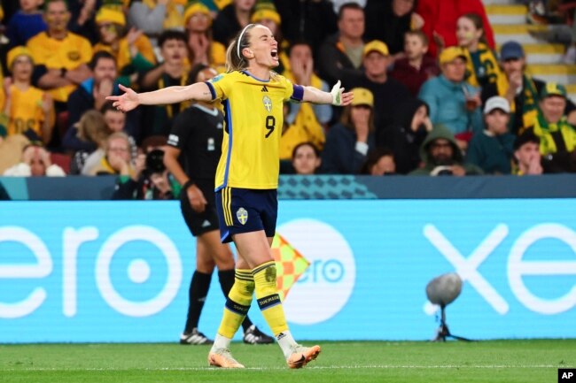 Sweden's Kosovare Asllani celebrates after scoring her team's second goal during the Women's World Cup third place playoff soccer match between Australia and Sweden in Brisbane, Australia, Aug. 19, 2023.