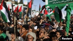 People protest in support of Palestinians in Gaza as the conflict between Israel and Hamas continues, in Sanaa, Yemen, Oct. 18, 2023.