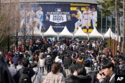 Fans head to the stadium before the 2024 Seoul Series between the Los Angeles Dodgers and the San Diego Padres at the Gocheok Sky Dom on March 20, 2024 in Seoul, South Korea.