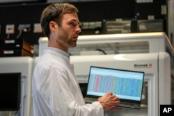 Dr. Axel Schmidt, co-author of the study from the Institute of Human Genetics at the University Hospital, shows the genome of composer Ludwig van Beethoven on a computer screen in Bonn, Germany, March 21, 2023.