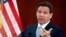 FILE - Florida Gov. Ron DeSantis answers questions March 7, 2023, at the state Capitol in Tallahassee, Fla. 