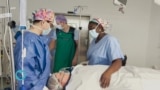 Female Surgeon Uses Music to Calm Patients