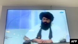 Neda Mohammad Nadim the minister of higher education is pictured while speaking in a live television broadcast of national TV channel, in Kabul on Dec. 22, 2022.
