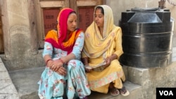 Rekha Sabharwal, right, who heads a women's community group in Mankrola village in India's Haryana state says unlike the past when the family dictated who to vote for, women now make their own choice. (Anjana Pasricha/VOA)