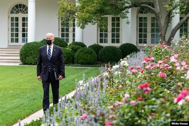 President Biden walks through the White House Rose Garden. (The White House)