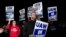 Striking United Auto Workers picket at Ford's Michigan Assembly Plant in Wayne, Mich., shortly after midnight Sept. 15, 2023. 
