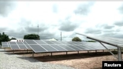 Image from video shows bank of solar panels in Abuja, Nigeria, August 5, 2023, after the World Bank announces plans to help fund construction of 1,000 mini solar power grids in Nigeria.