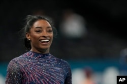 Simone Biles, of the United States, attends a gymnastics training session at Bercy Arena at the Summer Olympics in Paris, July 25, 2024.