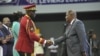 (FILE) Gabon Transitional President General Brice Oligui Nguema shakes hands with the President of the Central African Republic Faustin-Archange Touadera in Libreville on April 2, 2024.