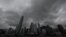 Awan hujan lebat terlihat di distrik Central pada 8 Oktober 2023 saat topan Koinu melintas Hong Kong. (Foto: AFP/Peter PARKS)