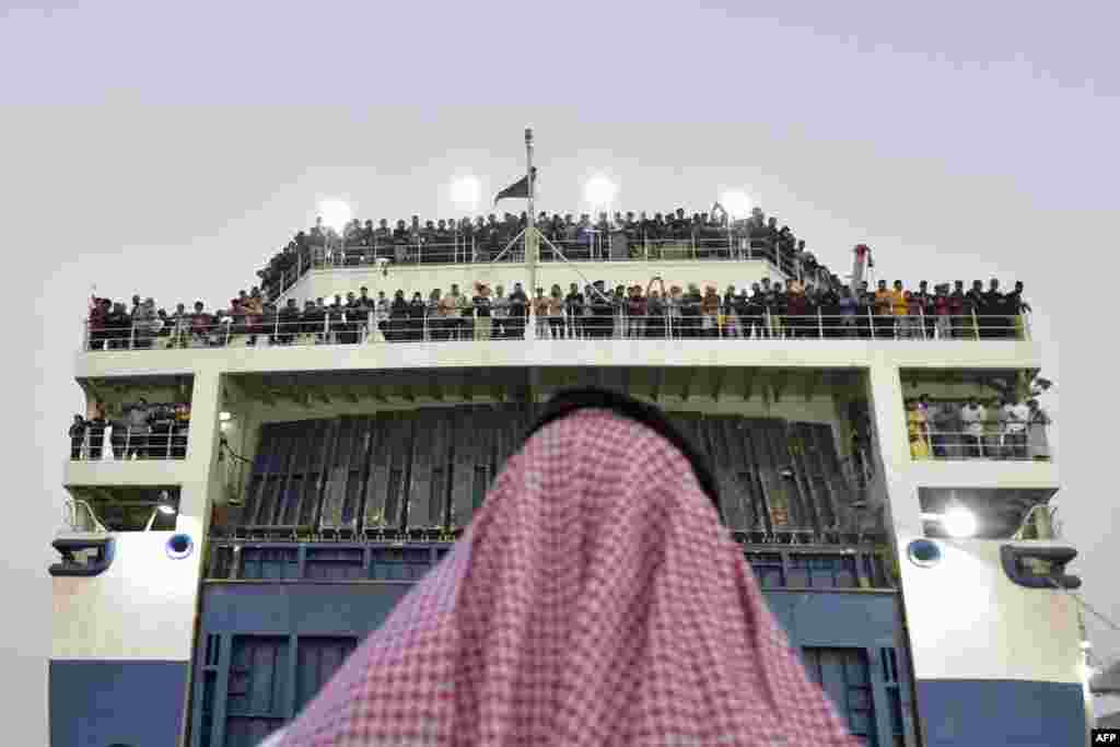 A boat with 1,687 civilians from more than 50 countries fleeing violence in Sudan, arrives at King Faisal navy base in Jeddah, Saudi Arabia.