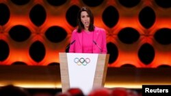 FILE - Janet Evans, Olympic swimming champion and chief athlete officer for LA2028, speaks at the presentation of Los Angeles 2028 at the 131st IOC session in Lima, Peru, Sept. 13, 2017.