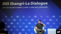 Ukraine’s President Volodymyr Zelenskyy listens to a question during a press conference after the 21st Shangri-La Dialogue summit at the Shangri-La Hotel in Singapore, June 2, 2024.