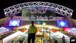 FILE - A member of the security team stands in front of the presidential debate site at the University of Nevada, Las Vegas in Las Vegas late Oct 16, 2016.