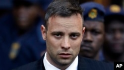 FILE - Oscar Pistorius leaves the High Court in Pretoria, South Africa, on June 15, 2016, after his sentencing proceedings. 