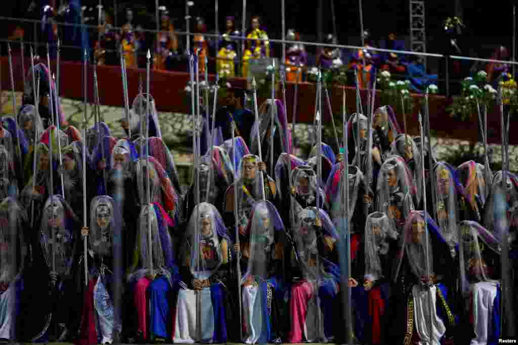 Worshipers attend the Day of the Spiritual Indoctrinator, annual celebrations at the Vale do Amanhecer (Valley of the Dawn) community in the Planaltina neighbourhood of Brasilia, Brazil.