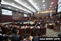 Sidang sengketa hasil pemilu di Mahkamah Konstitusi Jakarta, 5 April 2024. (Foto: Adek BERRY/AFP)