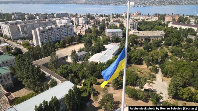 FILE - Ukrainian flag in Mykolaiv. (Adobe stock photo by Roman Soloviev)