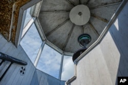 Sunlight fills the lantern room of the Hudson-Athens Lighthouse, June 12, 2024, in Hudson, New York.