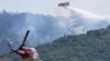 Firefighters battle California wildfire ahead of storms, lightning