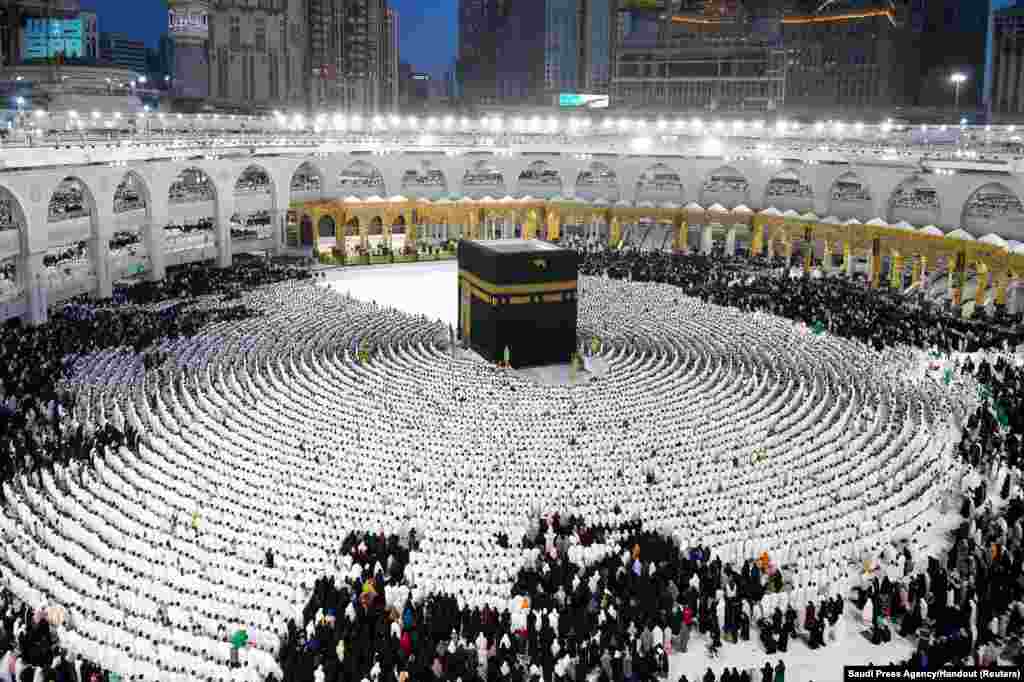 Muslim pilgrims perform evening prayers at the Grand Mosque during the holy month of Ramadan in the holy city of Mecca, Saudi Arabia.