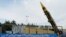 A new surface-to-surface ballistic missile called Khaibar with a range of 2,000 km, unveiled by Iran, is seen in Tehran, Iran. (WANA via Reuters)