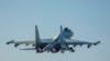 FILE - In this photo released by the Russian Defense Ministry's Press Service on June 25, 2021, a Su-35 fighter jet of the Russian air force takes off from Hemeimeem air base in Syria.