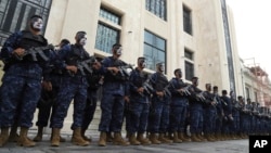 Military forces stand outside of the National Palace prior to El Salvador's President Nayib Bukele's inauguration for a second term in San Salvador, El Salvador, June 1, 2024.