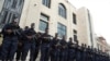 Military forces stand outside of the National Palace prior to El Salvador's President Nayib Bukele's inauguration for a second term in San Salvador, El Salvador, June 1, 2024. 