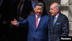 Hungarian President Tamas Sulyok receives Chinese President Xi Jinping at the Buda Castle in Budapest, Hungary, May 9, 2024. 