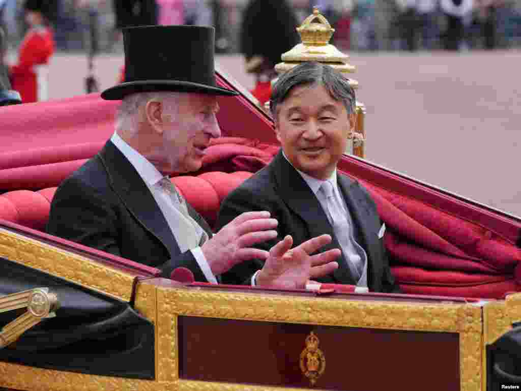 Britain's King Charles with Emperor Naruhito of Japan arrives at Buckingham Palace, London, during Emperor Naruhito's state visit to Britain, June 25, 2024.