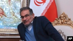 FILE - Head of Iran's Supreme National Security Council, Ali Shamkhani sits in a meeting in Tehran, June 12, 2021. Shamkhani visited the United Arab Emirates, March 16, 2023.