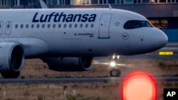 FILE -- A Lufthansa aircraft rolls to the parking position at the airport in Frankfurt, Germany, Sept. 1, 2022. 