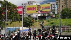 En Fotos | Venezolanos atrapados en el medio mientras el gobierno y la oposición afirman haber ganado las elecciones