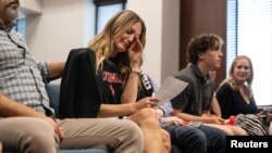 Melissa Alexander cries on Aug. 22, 2023, after testifying during a legislative session called to discuss gun violence in the wake of a fatal shooting at The Covenant School in Nashville, Tennessee, in March, 2023.