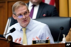 FILE - Chairman Jim Jordan, R-Ohio, left, speaks during a House Judiciary subcommittee hearing on Capitol Hill, Feb. 9, 2023.