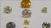 A still image from an Aug. 15, 2016, video shows colored synthetic diamonds on display at De Beers' International Institute of Diamond Grading and Research in Maidenhead, England. (Reuters/Reuters TV)