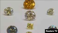 A still image from an Aug. 15, 2016, video shows colored synthetic diamonds on display at De Beers' International Institute of Diamond Grading and Research in Maidenhead, England. (Reuters/Reuters TV)