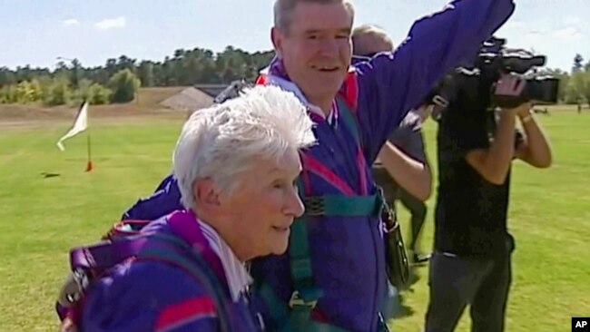 In this image made from video, Clare Nowland reacts following her skydive in Canberra, Australia, April 6, 2008. Nowland died Wednesday at age 95, days after a police officer shot her with a stun gun. (Australian Broadcasting Corp. via AP)