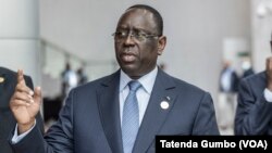 FILE - Outgoing chairperson of the African Union and Senegal President Macky Sall arrives on the second day of the 36th Ordinary Session of the Assembly of the African Union (AU) at the Africa Union headquarters in Addis Ababa, Ethiopia, Feb. 19, 2023.