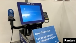 A blue error screen on a register is seen at a department store affected by a cyber outage in Brisbane, Australia, July 19, 2024.