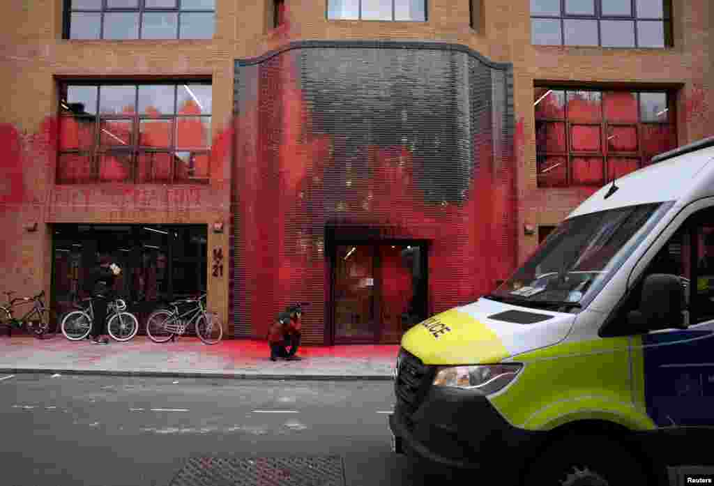 The Labour Party&#39;s headquarters is covered in red paint after a demonstration by &quot;Youth Demand&quot; supporters in London.