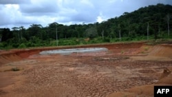FILE - A partial view of "Las Crucitas Camp" where Canadian Infinito Gold Company's had a project to exploit a gold mine, in Las Crucitas de Cutris, Costa Rica.
