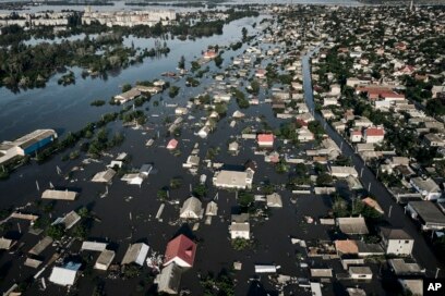 Latest in Ukraine: Drinking Water Rushed to Those Stranded or Fleeing  Flooding After Rupture of Dam