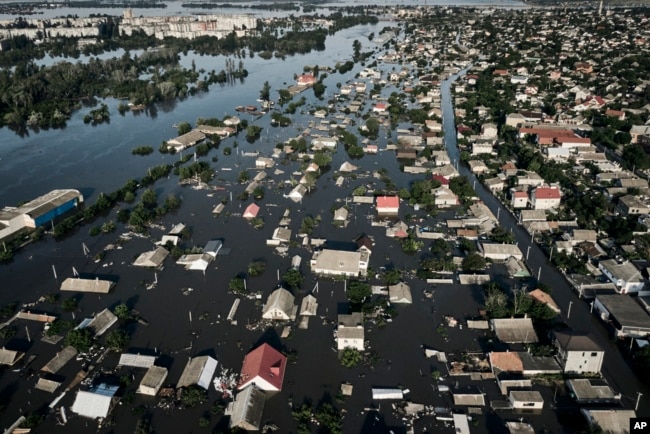 Streets are flooded in Kherson, Ukraine, June 7, 2023 after the walls of the Kakhovka dam collapsed.