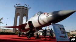 FILE - A fighter jet JF-17 Thunder jointly built by Pakistan and China on display in Karachi, Pakistan, on Nov 25, 2008. A new study indicates Western sanctions are making it harder for Moscow to sell weapons, opening the door for more Chinese-made arms. 
