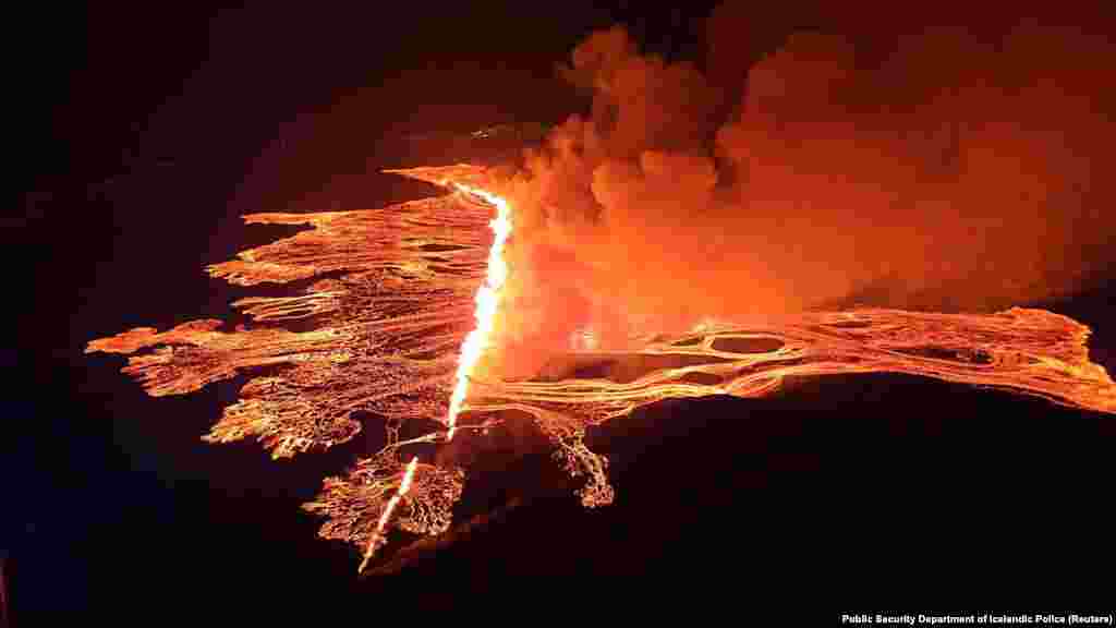 A volcanic eruption takes place near Grindavik, Iceland, March 16, 2024, in this handout picture provided by the Public Security Department of Icelandic Police.