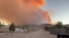 FILE - Fire and smoke rise from the Silver King Fire in Marysvale, Piute County, Utah, U.S., July 6, 2024 in this screen grab obtained from a social media video. (Trevor Urry/via Reuters) 